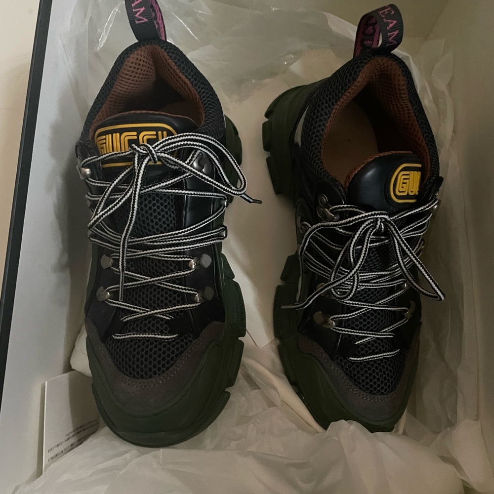 authentic Gucci sneakers runs really big and fits a person who wears a men’s 6.5